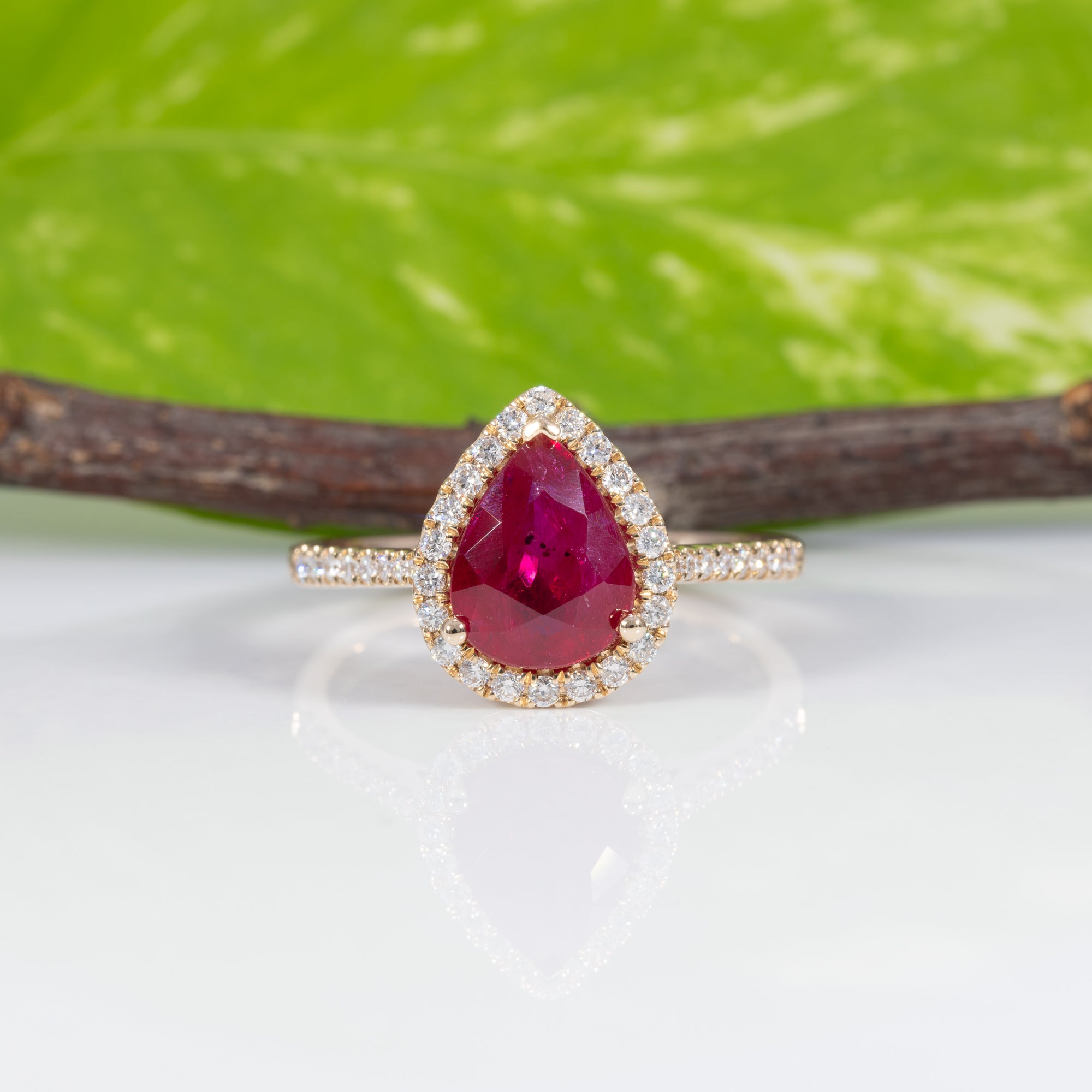 14K yellow gold GIA Mozambique ruby ring with diamond accents