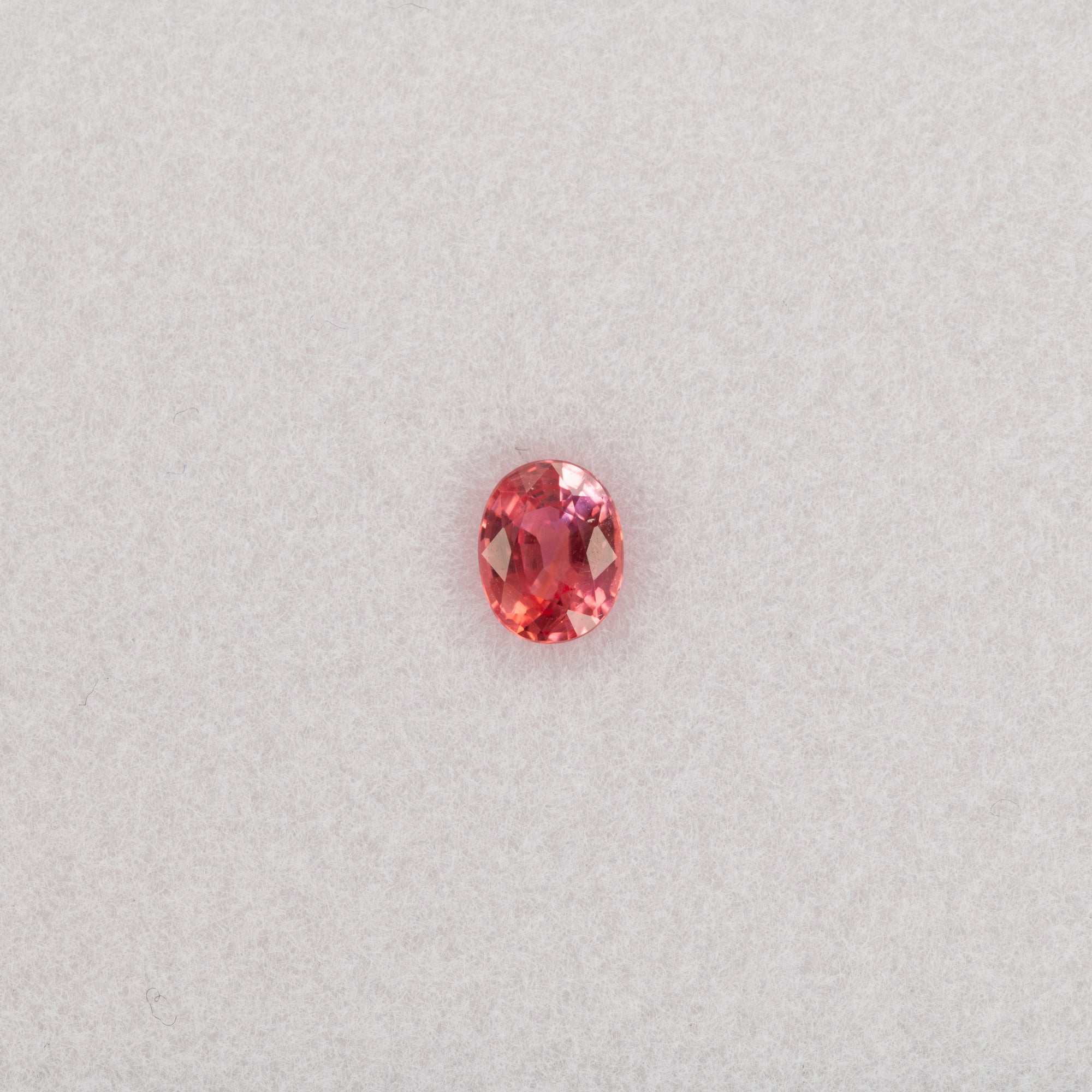 0.47 carat natural padparadscha sapphire, oval 5.2x4.1mm pink-orange loose gemstone
