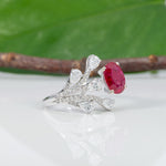 14K white gold mozambique ruby ring with diamond accents