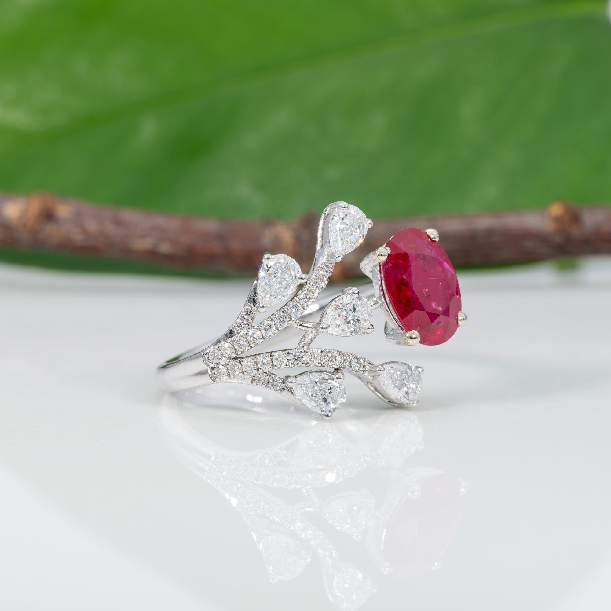 14K white gold mozambique ruby ring with diamond accents