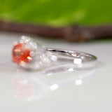 14K white gold padparadscha sapphire ring with diamond accents