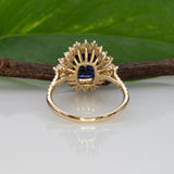 14K yellow gold GIA Ceylon sapphire cushion ring with diamond halo