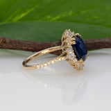14K yellow gold GIA Ceylon sapphire cushion ring with diamond halo