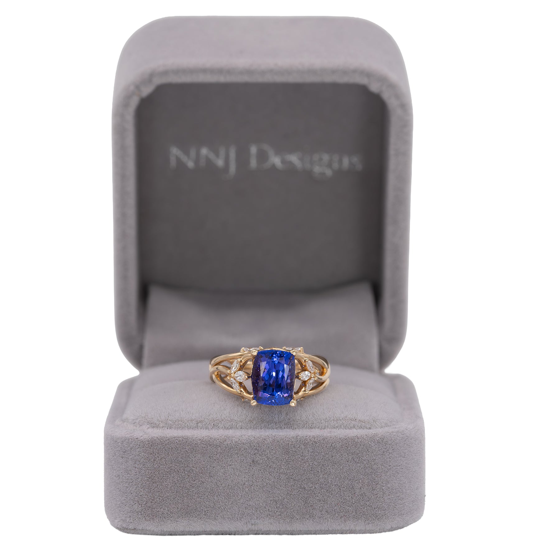 14K yellow gold cushion tanzanite ring with diamond accents