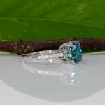 14K white gold Cambodian blue zircon cushion ring with diamond accents