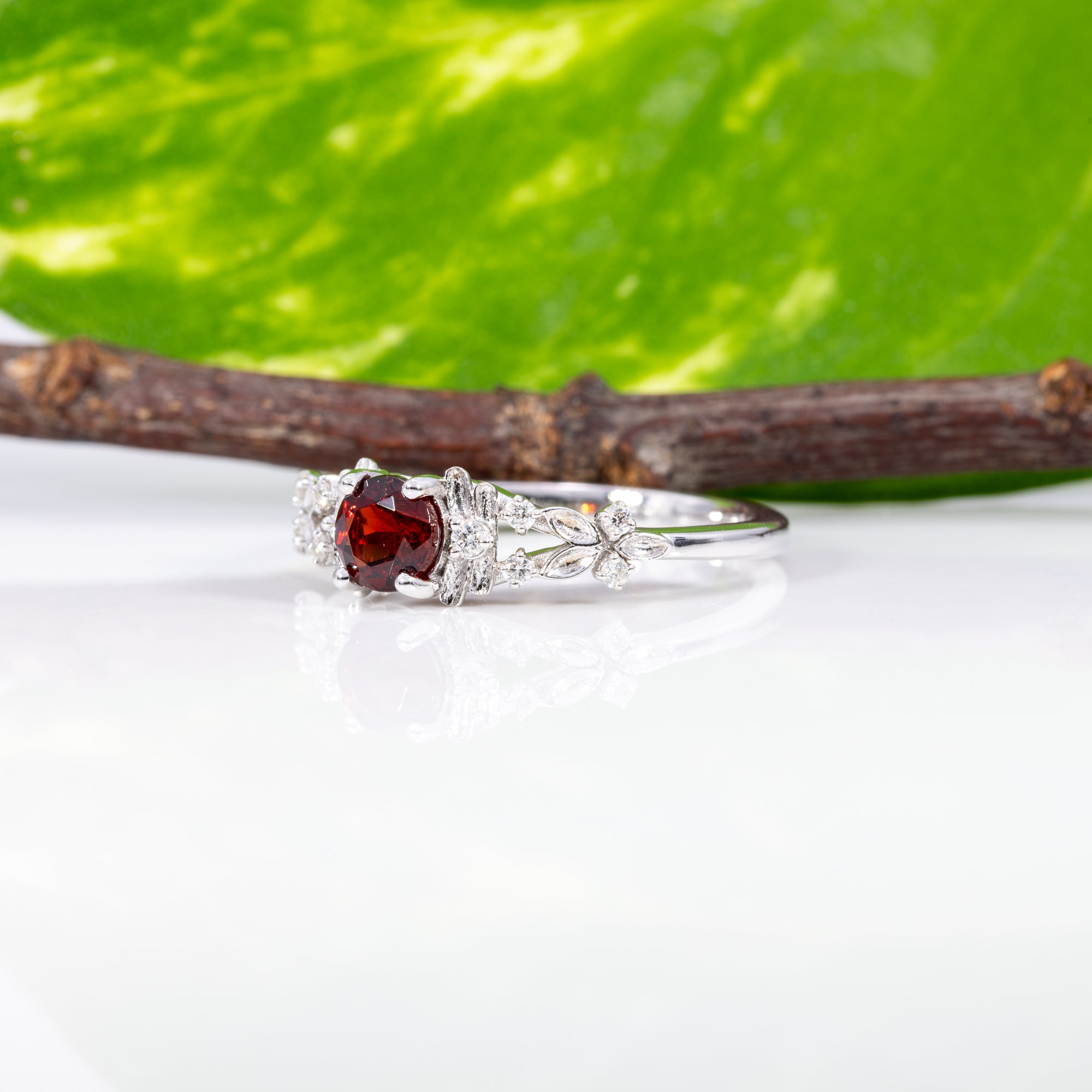 14K white gold red spinel ring with diamond accents