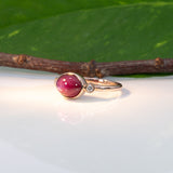 14K rose gold star ruby cabochon ring with diamond accents