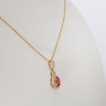 14K yellow gold padparadscha sapphire pendant