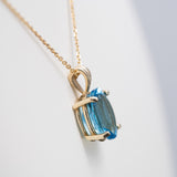 14K Yellow Gold Swiss Blue Topaz Pendant