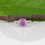 14K white gold pink sapphire pear ring with diamond halo