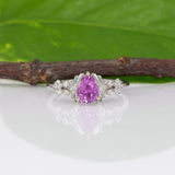 14K white gold pink sapphire pear ring with diamond halo