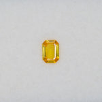 0.88 carat natural yellow sapphire, emerald cut 7x5mm loose yellow gemstone