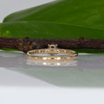 14K yellow gold purple sapphire round ring with diamond halo
