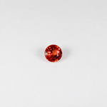 0.69 carat natural orange sapphire, round 5mm Ceylon loose gemstone