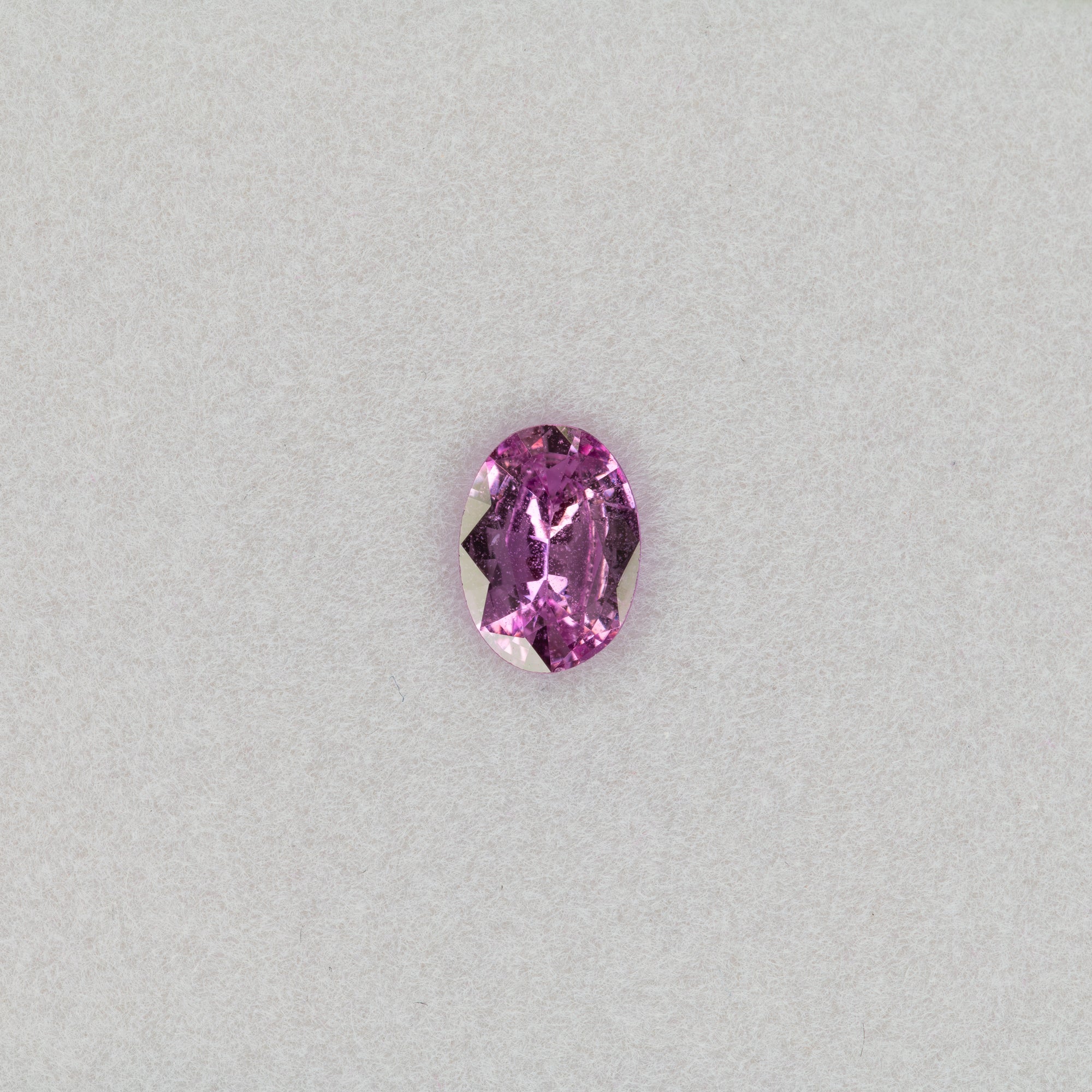 0.66 carat natural pink sapphire, oval 6.9x5mm loose gemstone