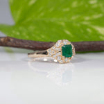 14K yellow gold Colombian emerald ring with diamond accents