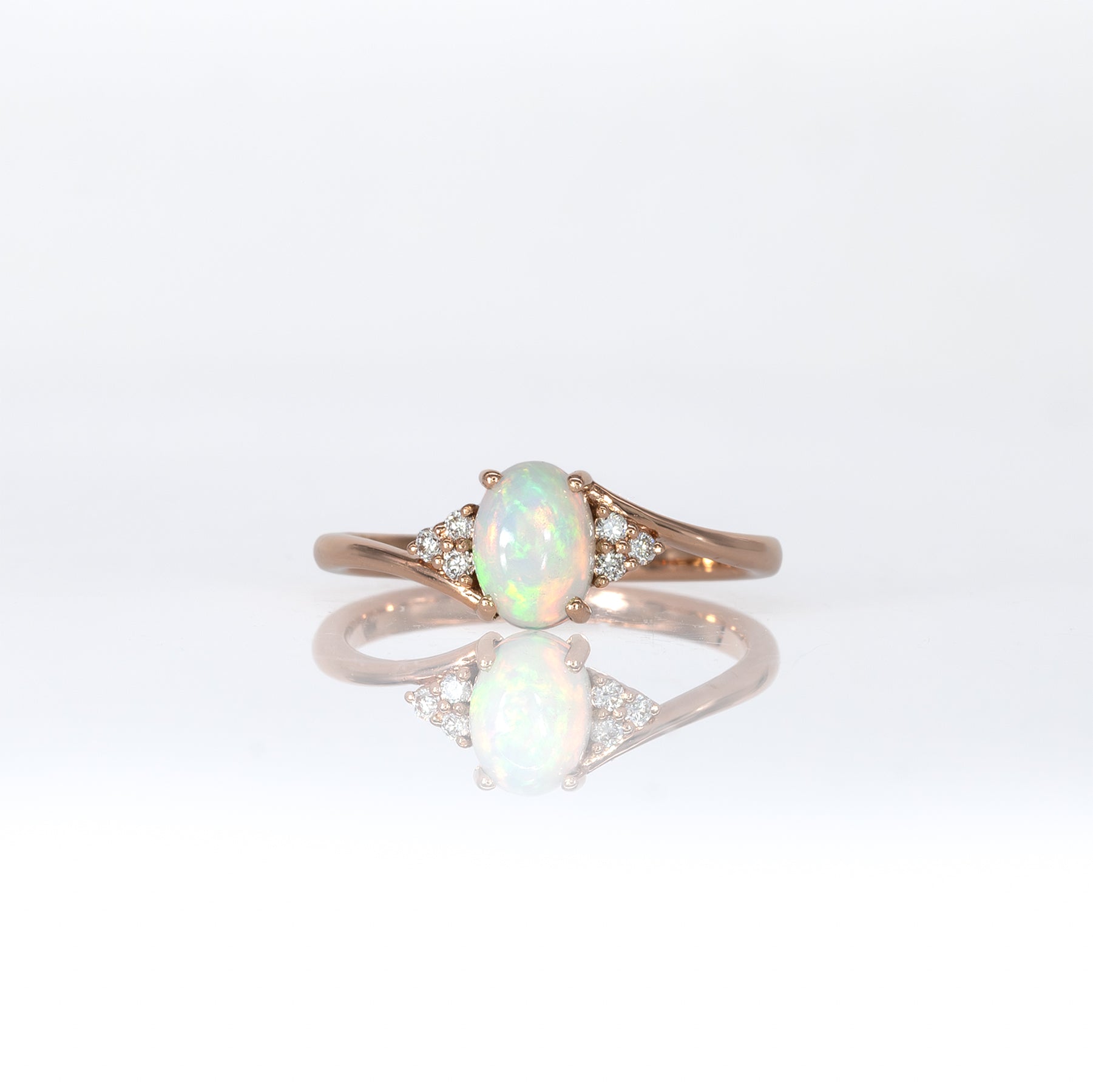 14K rose gold Ethiopian opal cabochon ring with diamond accents