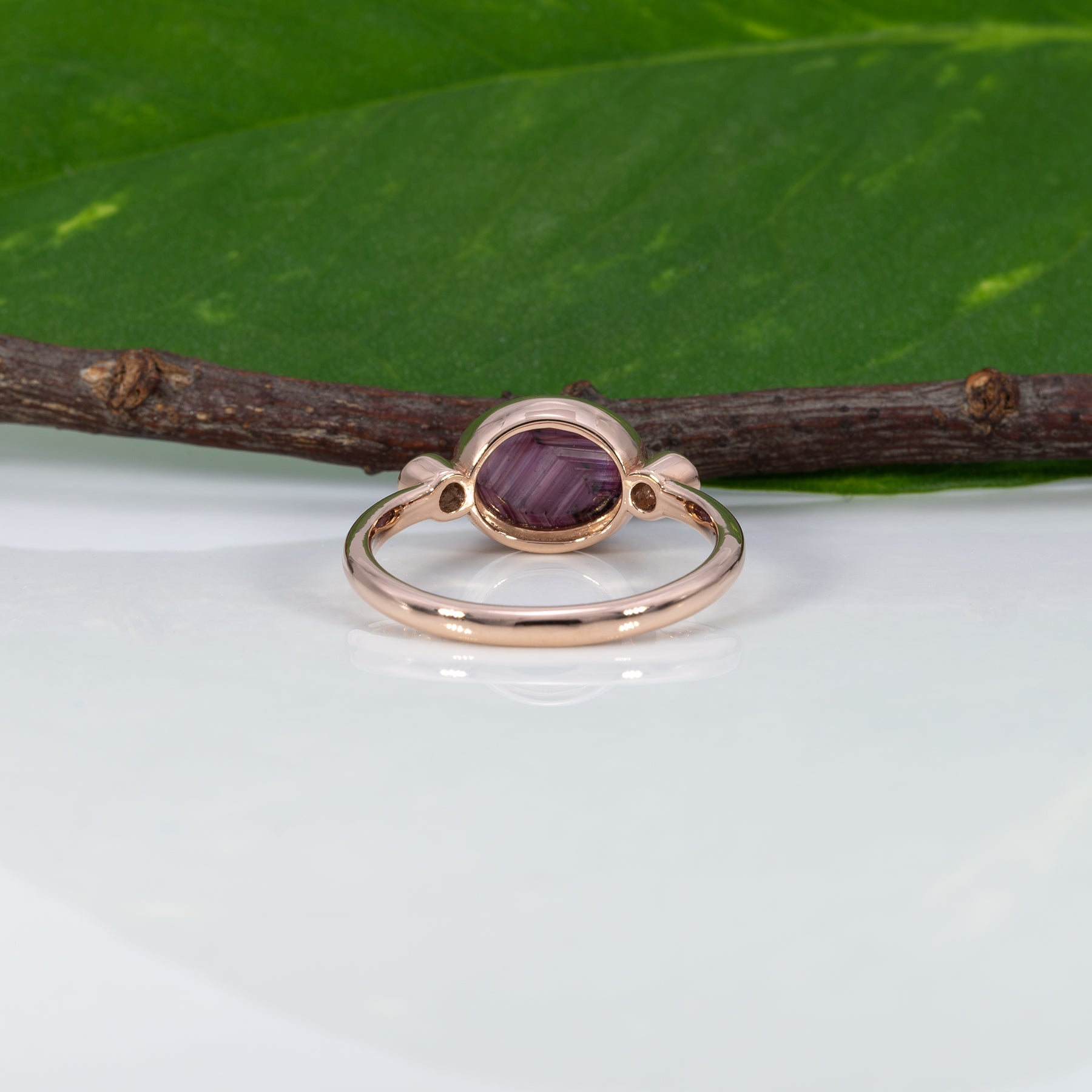 14K rose gold star ruby cabochon ring with diamond accents