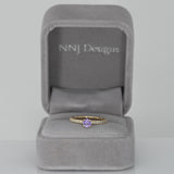 14K yellow gold purple sapphire round ring with diamond halo