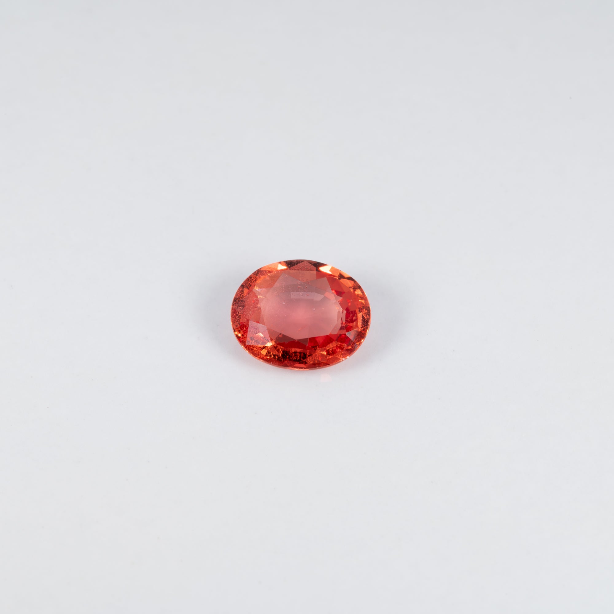 1.26 carat natural padparadscha sapphire, oval 7.6x6.3mm pink-orange loose gemstone