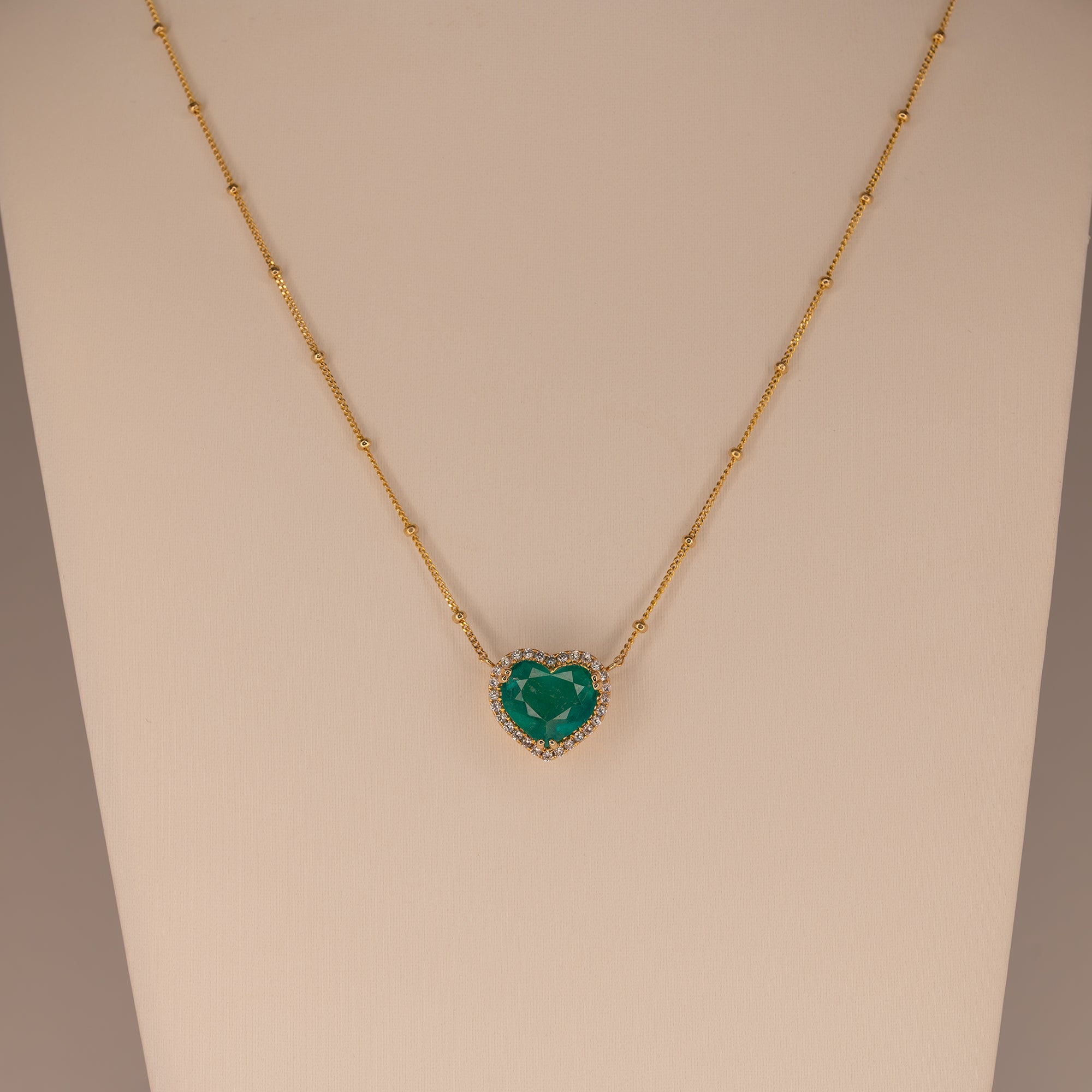 14K yellow gold colombian emerald pendant with diamond accents