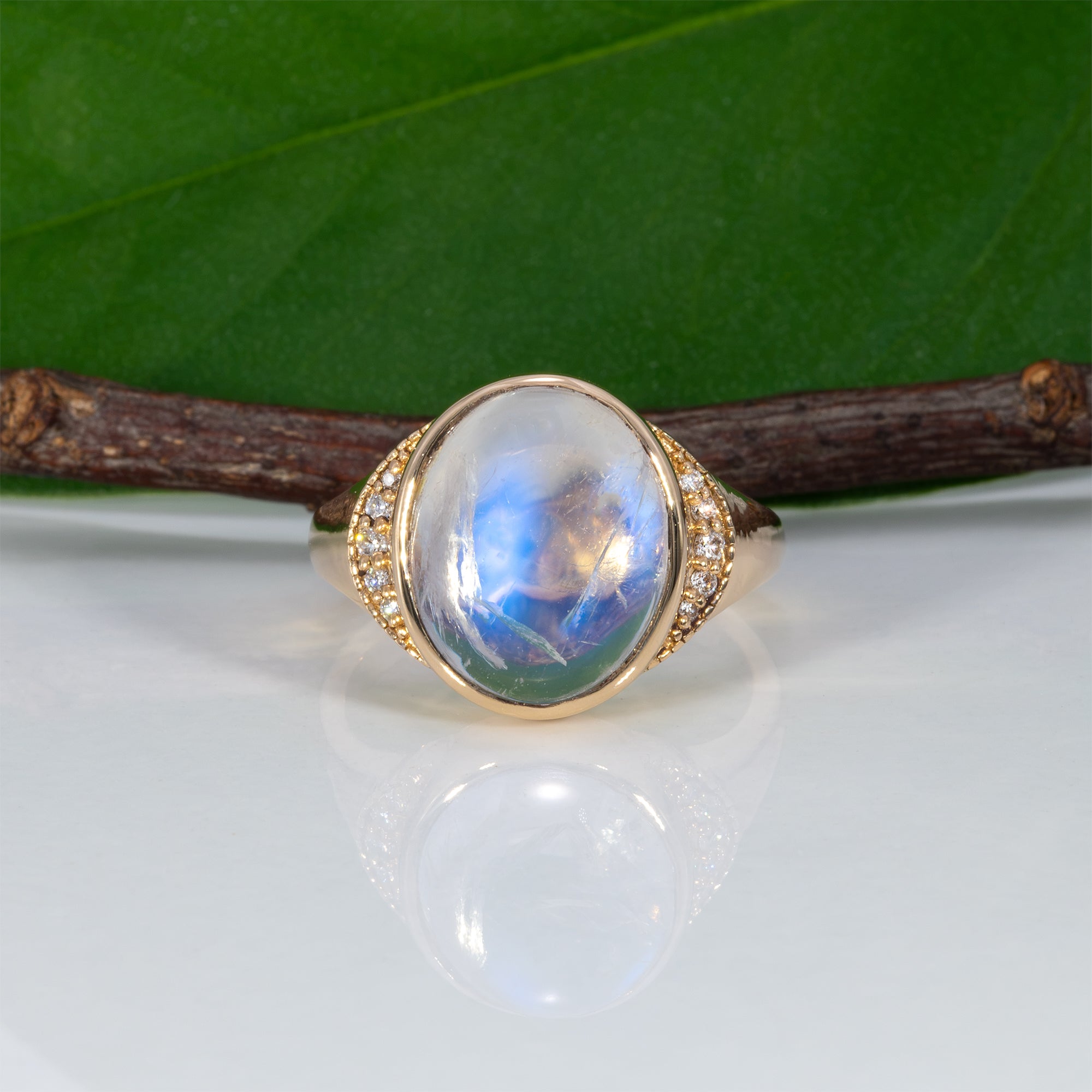 14K yellow gold rainbow moonstone cabochon ring with diamonds