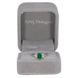 14K white gold Zambian emerald ring with diamond accents