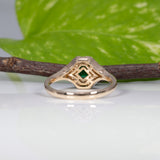 14K yellow gold Colombian emerald ring with diamond accents