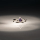 14K white gold pear alexandrite ring with diamond halo