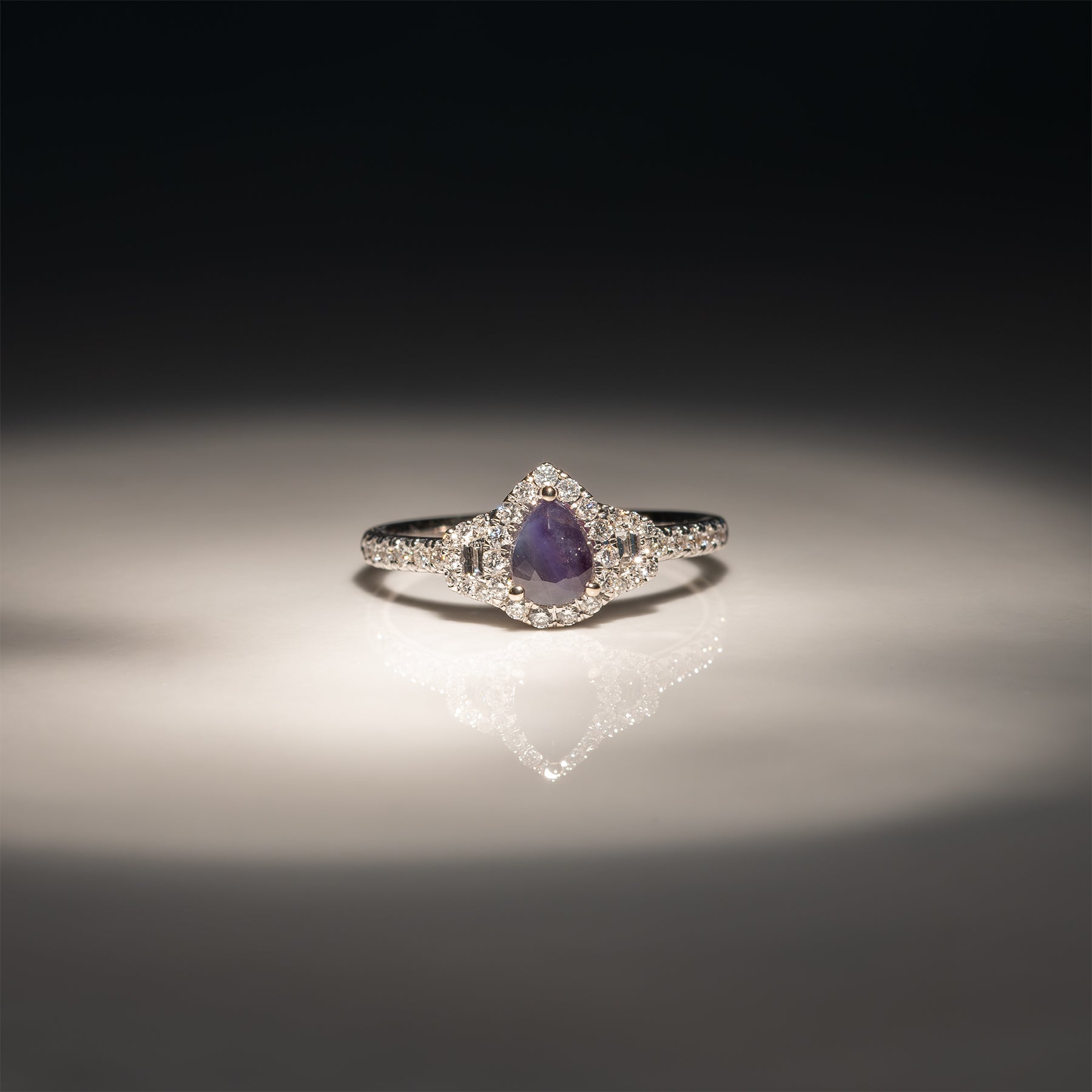 14K white gold pear alexandrite ring with diamond halo