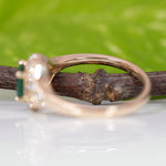 14K yellow gold Colombian emerald ring with diamond accents