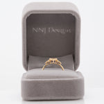 14K yellow gold purple spinel round ring with diamond accents