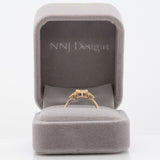 14K yellow gold purple spinel round ring with diamond accents