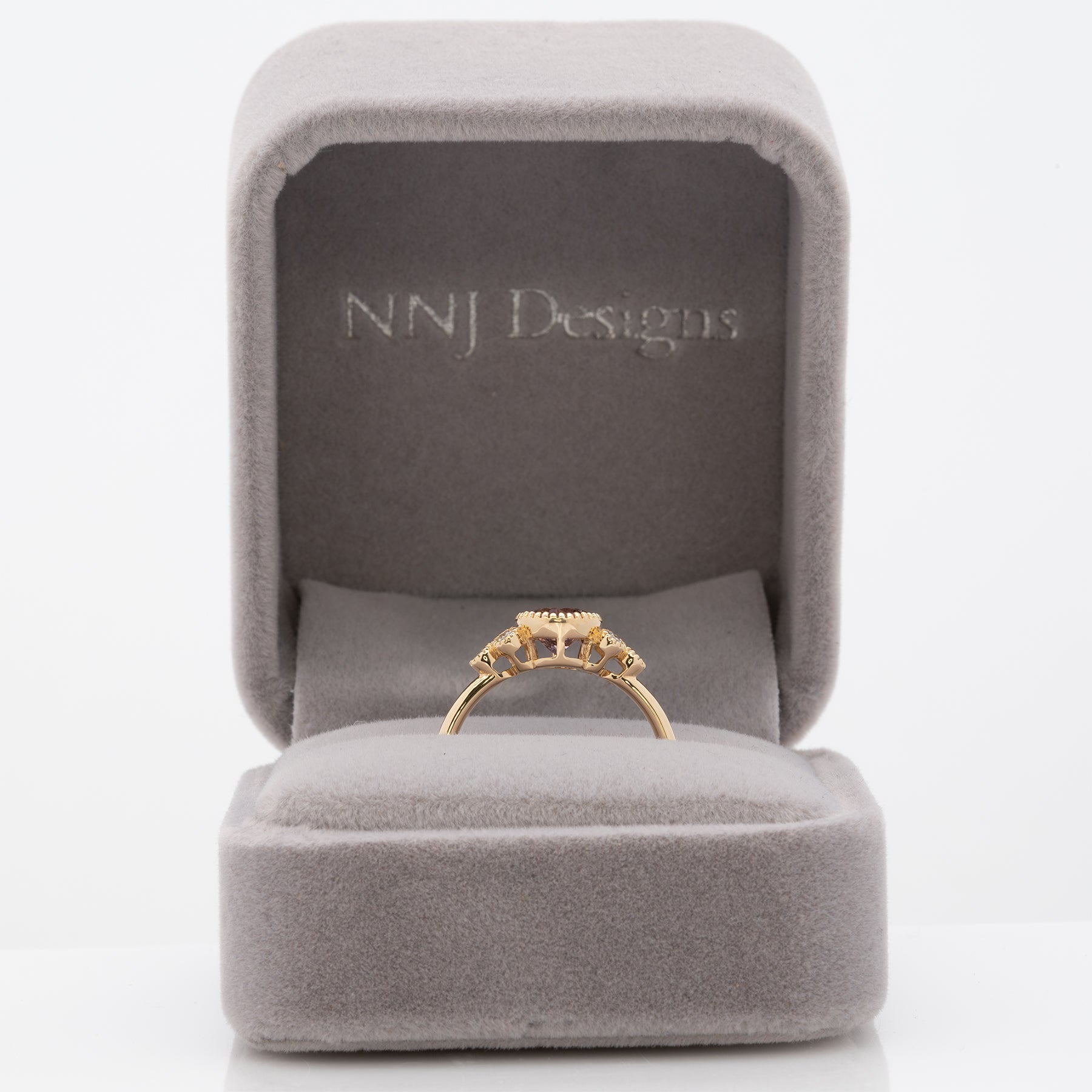 14K yellow gold purple spinel round ring with diamond accents