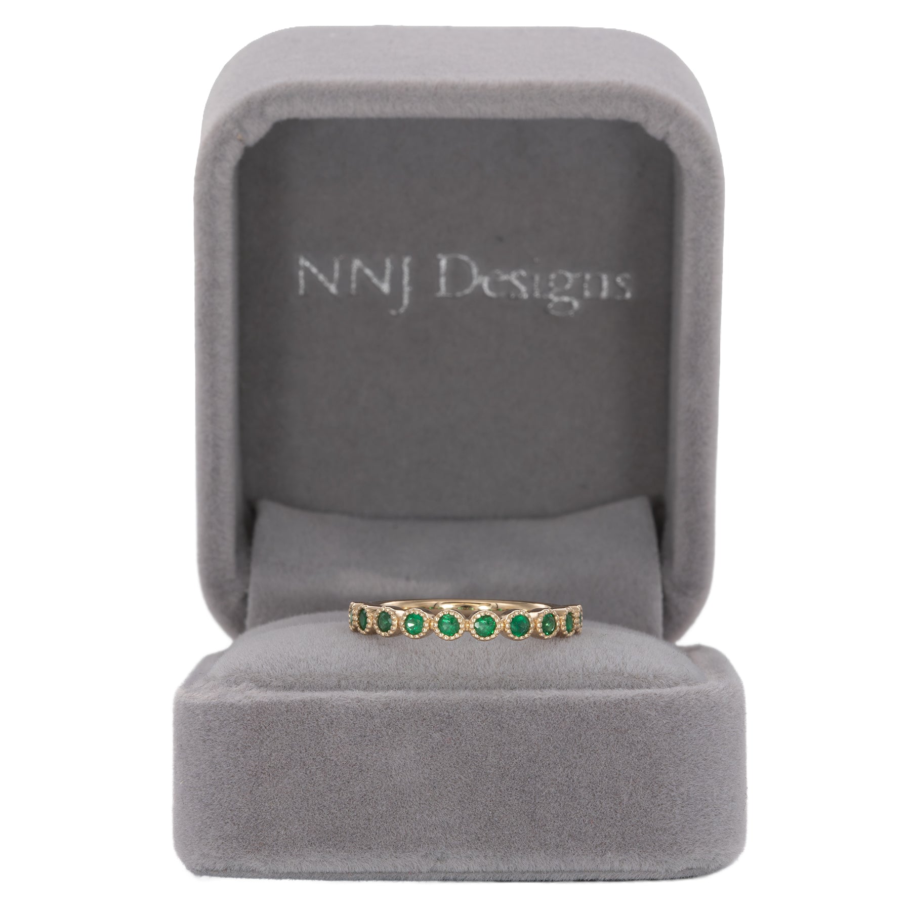 14K yellow gold band with round Zambian emerald accents