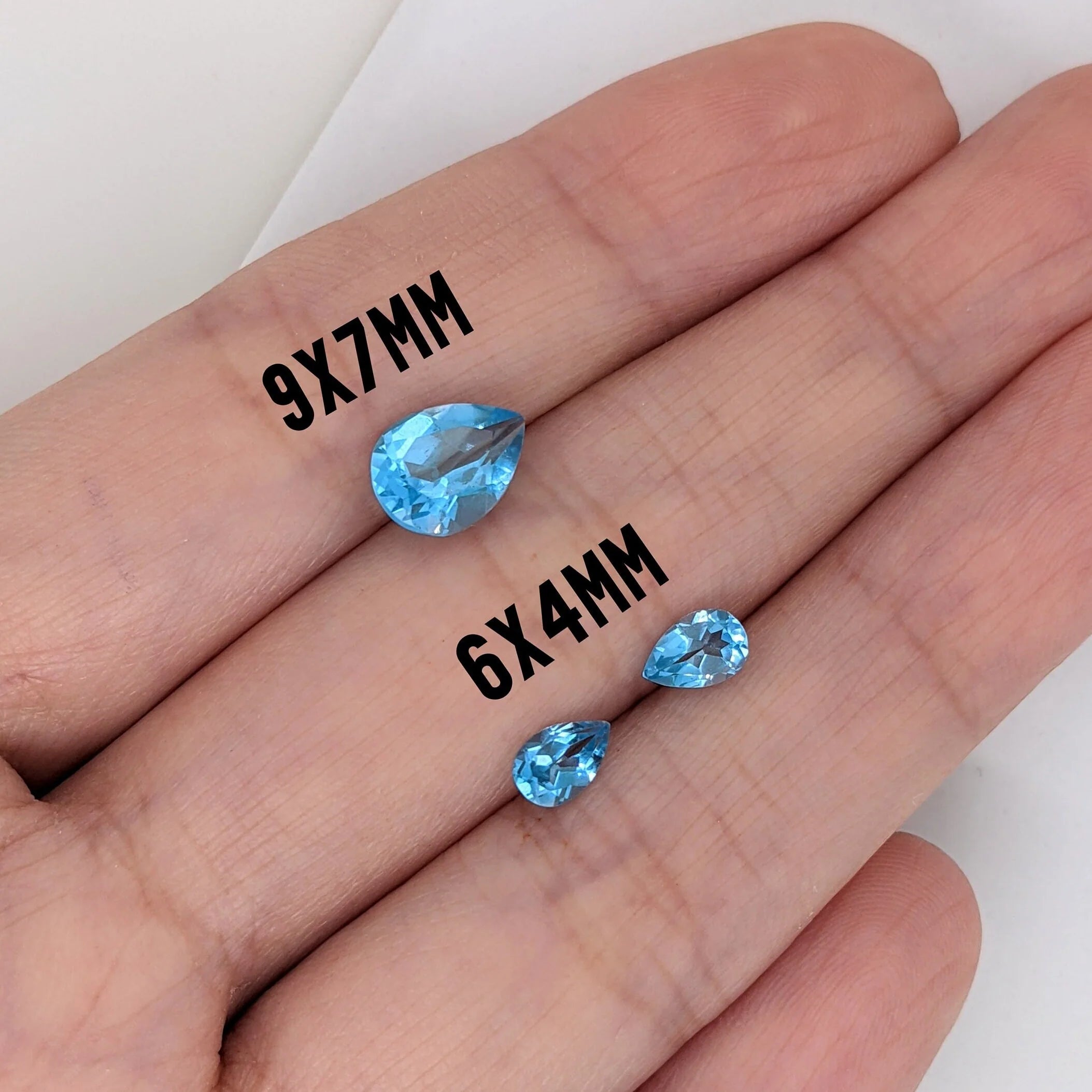 natural Brazilian Swiss blue topaz, pear cut calibrated loose gemstone – view 3