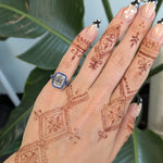platinum lab grown diamond ring with blue sapphire accents