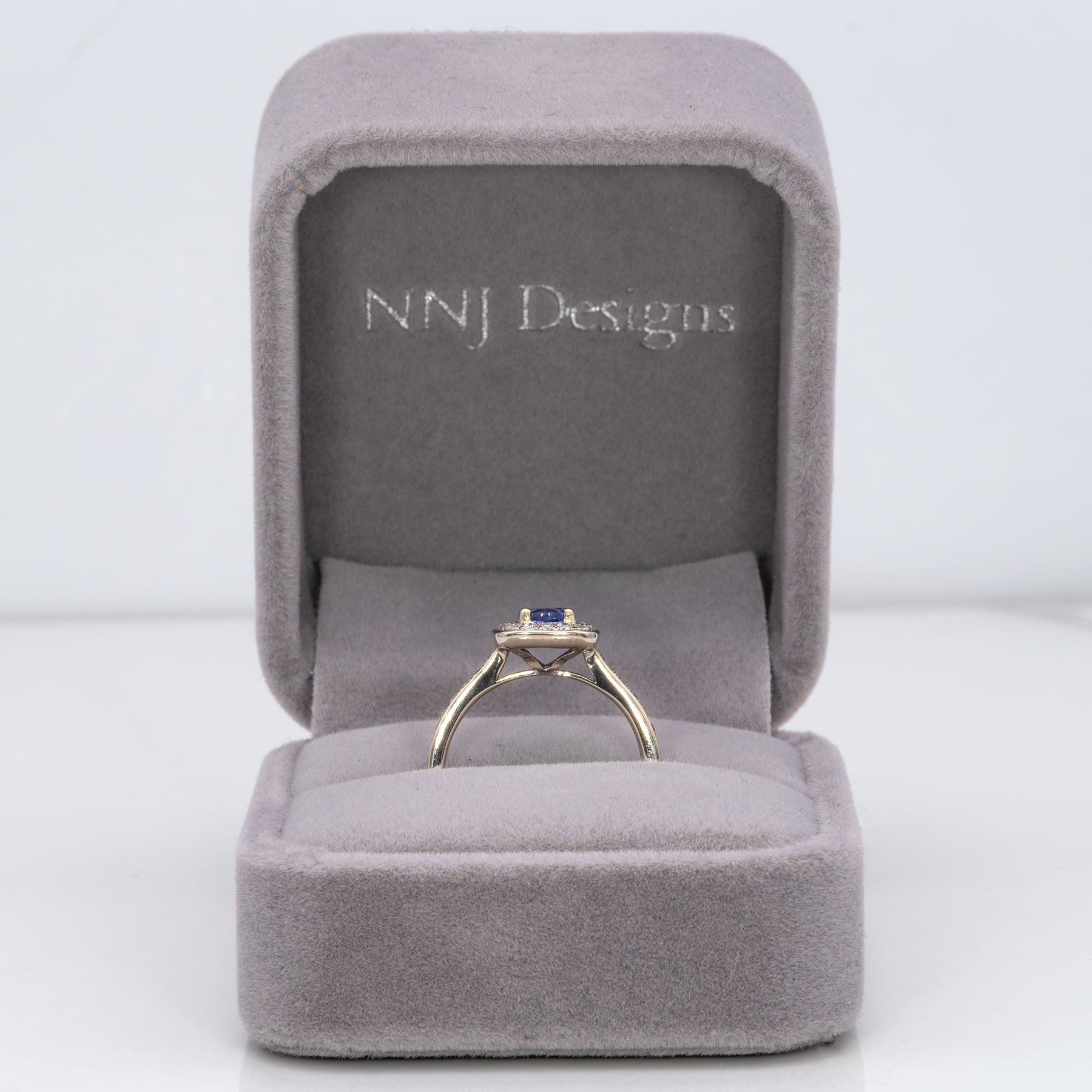 14K yellow gold tanzanite estate ring with diamond accents