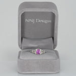 14K white gold pink sapphire pear ring with diamond halo