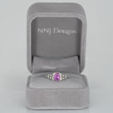 14K white gold pink sapphire pear ring with diamond halo