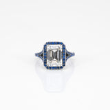 platinum lab grown diamond ring with blue sapphire accents