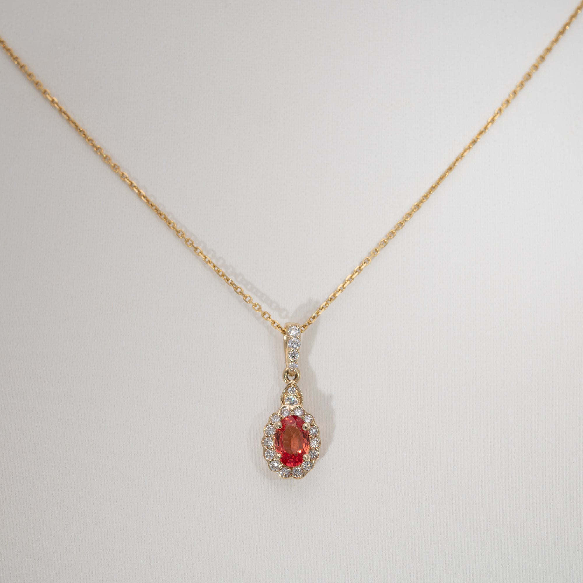 14K yellow gold padparadscha sapphire pendant