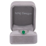 14K white gold Colombian emerald ring with diamond accents