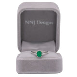 14K white gold Colombian emerald ring with diamond accents