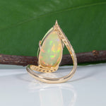 14K yellow gold Ethiopian opal cabochon ring with diamonds