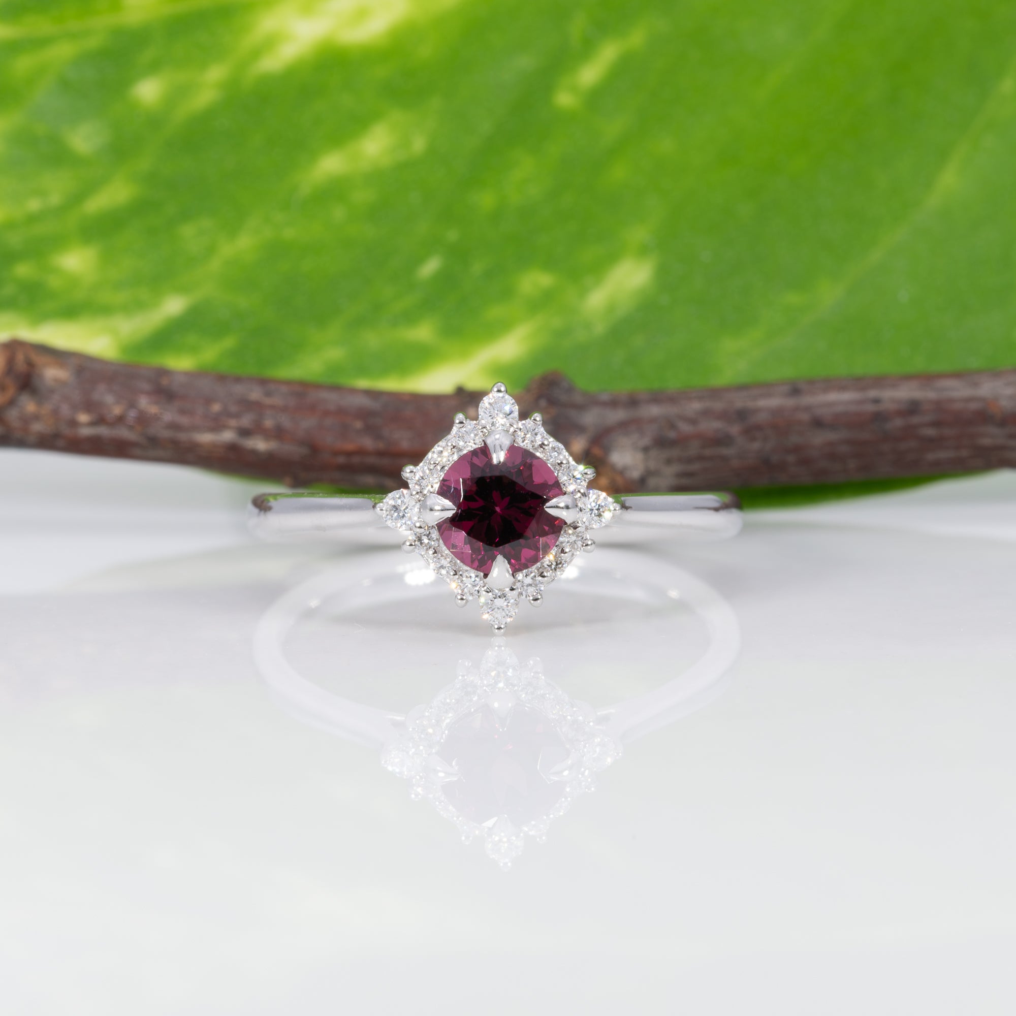 14K white gold red spinel ring with diamond halo