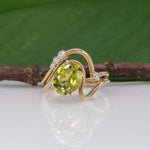 14K yellow gold sphene ring with diamond halo