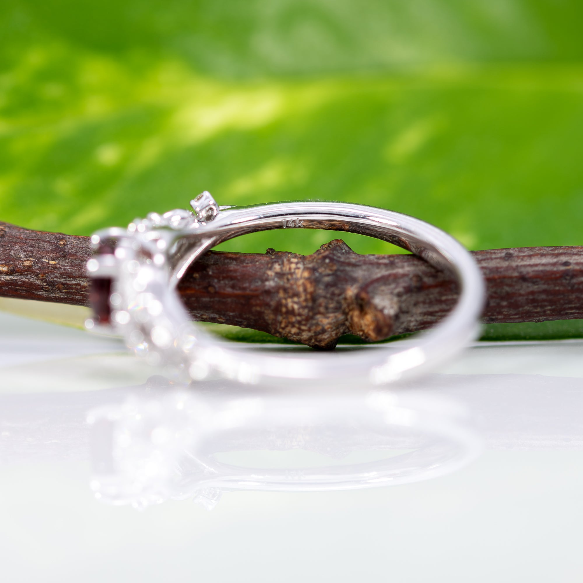 14K white gold red spinel ring with diamond accents