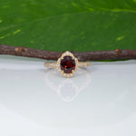 14K yellow gold red spinel ring with diamond accents