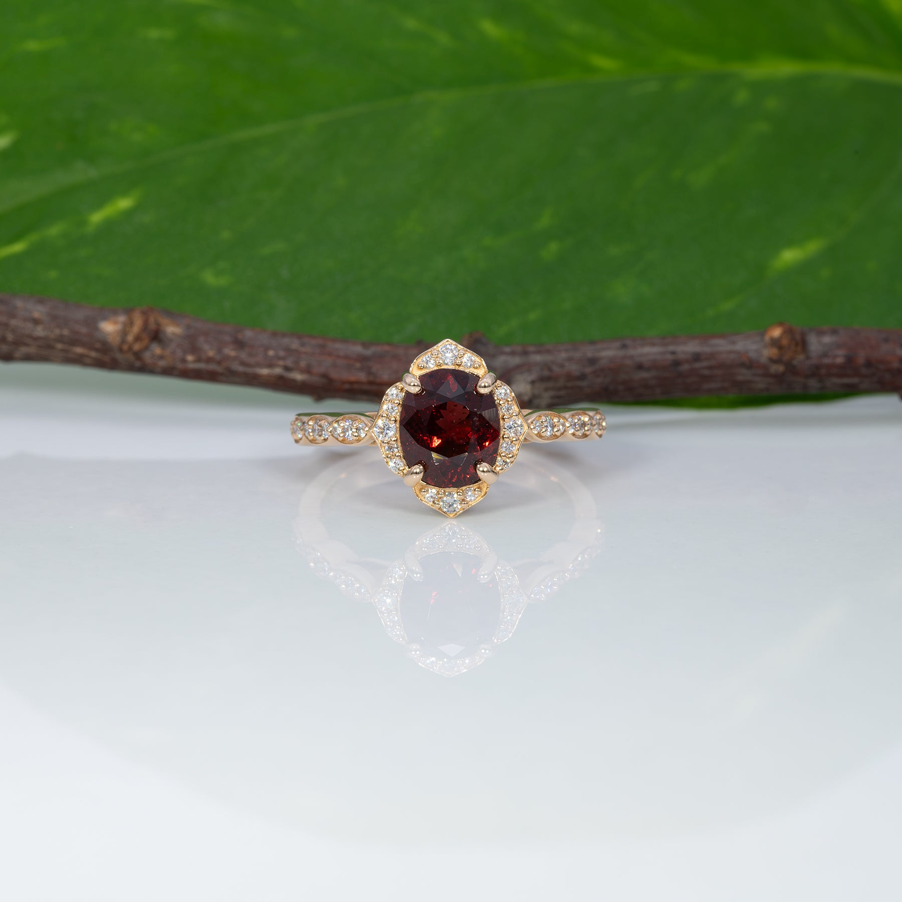 14K yellow gold red spinel ring with diamond accents